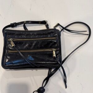 Black Crossbody Bag with Adjustable Strap and Glossy Finish. LIKE NEW